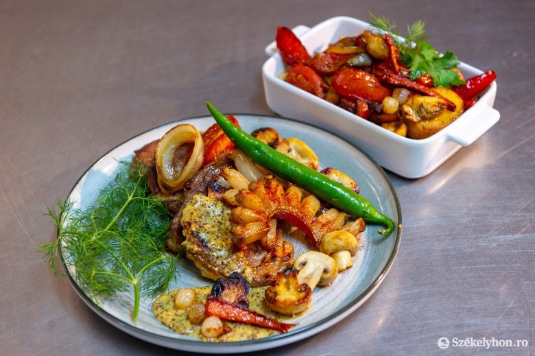 Juicy chop, crispy vegetables: hearty, quick-cooked food on the table thumbnail